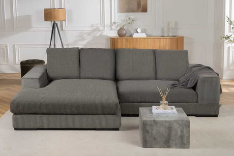 Sofa narożna w nowoczesnym stylu z poduszkami i elastycznym montażem otomany