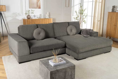 Sofa narożna w nowoczesnym stylu z poduszkami i elastycznym montażem otomany