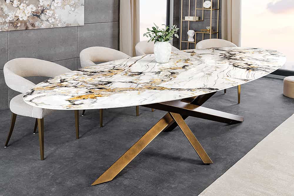 Stół z ceramicznym blatem , metalowa złota podstawa, elegancki do jadalni.