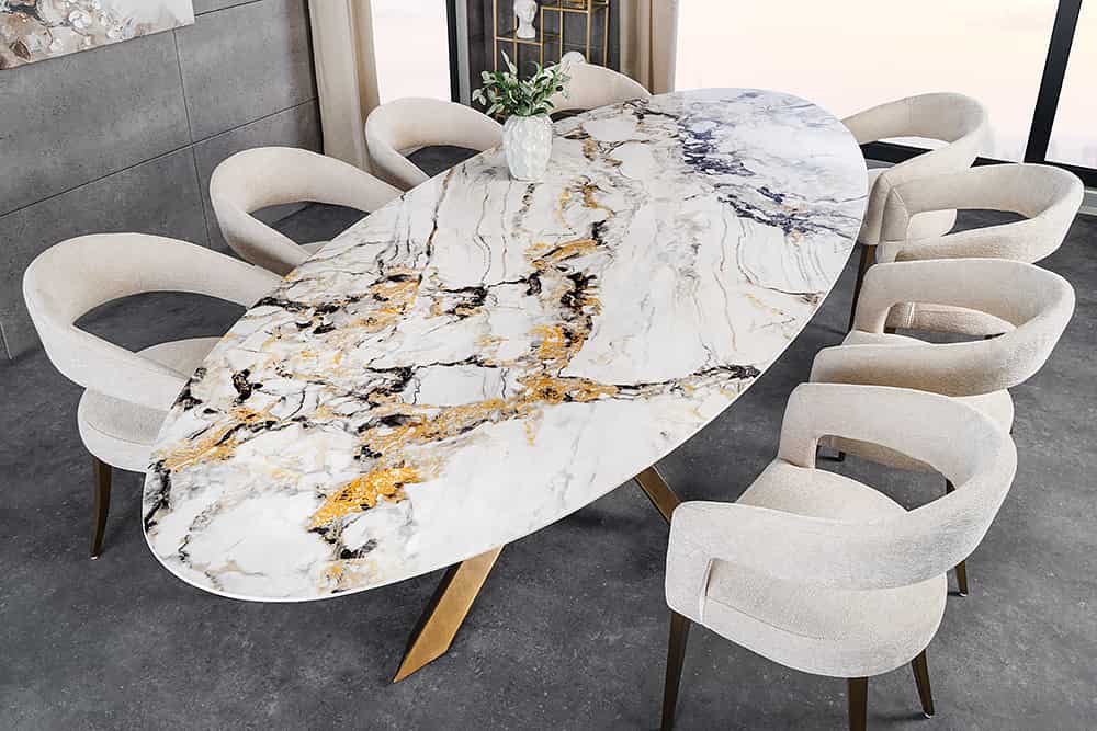 Stół z ceramicznym blatem , metalowa złota podstawa, elegancki do jadalni.