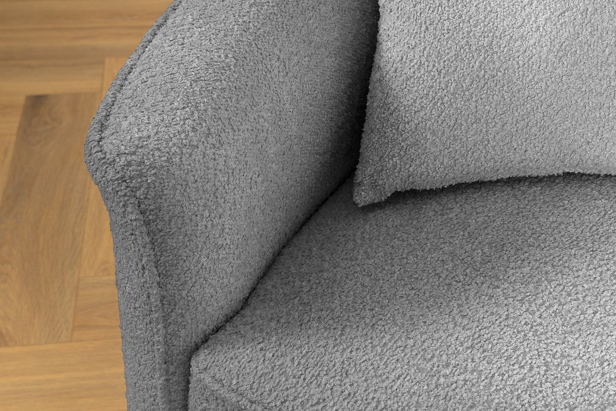 Beżowa sofa z tkaniny boucle o opływowym kształcie – nowoczesny mebel wypoczynkowy do eleganckiego salonu