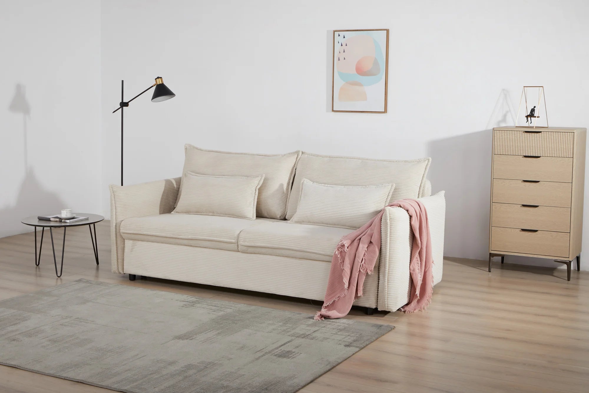 Rozkładana sofa sztruksowa w kolorze beżowym – nowoczesna i wygodna do salonu