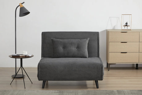 Rozkładany fotel tapicerowany sztruksem w kolorze szarym na czarnych nóżkach do salonu, sypialni