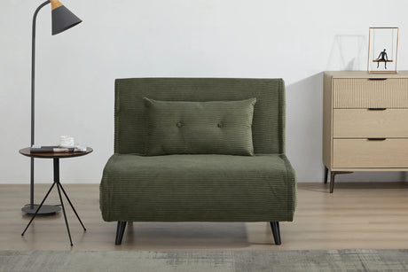 Rozkładany fotel tapicerowany sztruksem w kolorze zielonym na czarnych nóżkach do salonu, sypialni