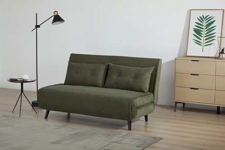 Rozkładany fotel tapicerowany sztruksem w kolorze zielonym na czarnych nóżkach do salonu, sypialni