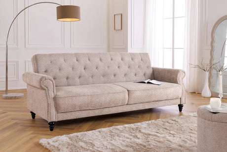 Trzyosobowa sofa w stylu klasycznym z tkaniny boucle, z pikowaniem, drewnianymi nogami i funkcją spania.