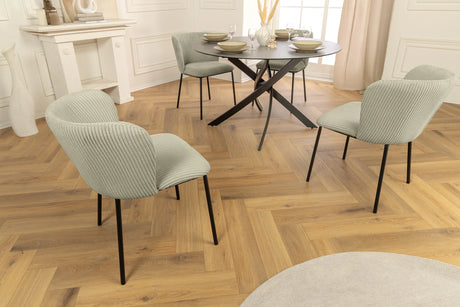 Nowoczesne krzesło z tapicerką ze sztruksu o prążkowanej fakturze i czarnymi nogami z metalu – elegancki dodatek do jadalni lub salonu