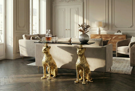 Luksusowa, nowoczesna konsola z czarnym marmurowym blatem i złotą podstawą.