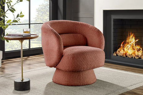Fotel NOVA w rdzawej tkaninie boucle z funkcją obrotową – nowoczesny design i komfort do salonu