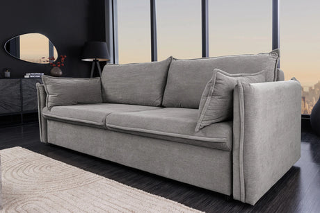 Rozkładana sofa sztruksowa w kolorze szarym – nowoczesna i wygodna do salonu