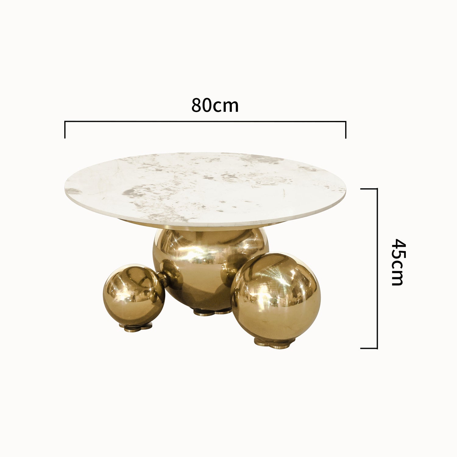 Stolik kawowy z okrągłym białym blatem marmurowym i złotą podstawą z trzech chromowanych kul, nowoczesny design
