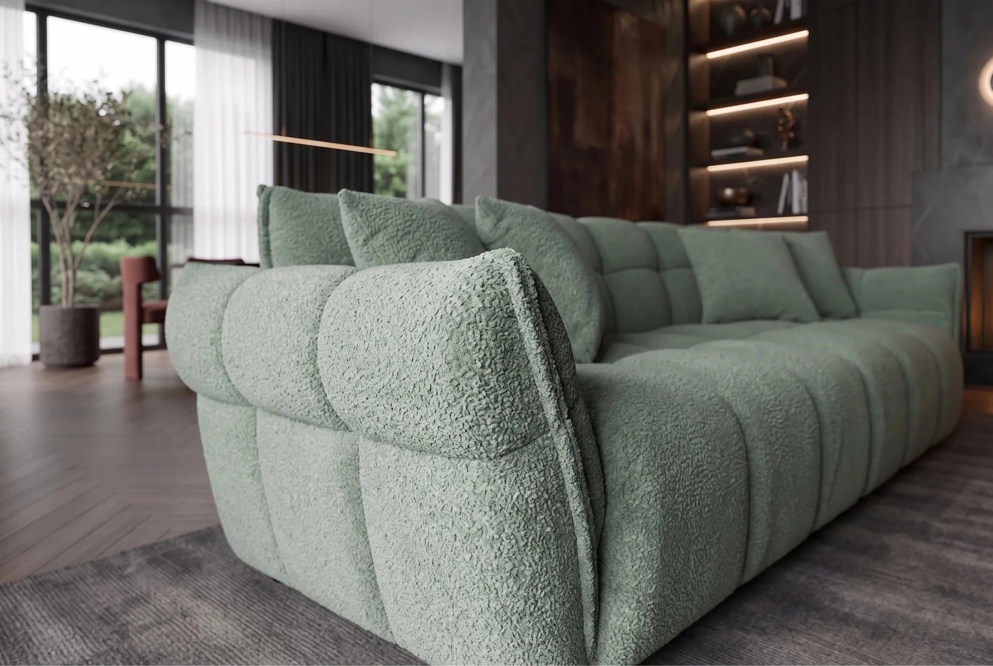 Zielona sofa CLOUD w tkaninie bouclé o miękkiej zaokrąglonej formie do nowoczesnego salonu
