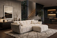 Beżowa sofa CLOUD w tkaninie boucle o miękkiej zaokrąglonej formie do nowoczesnego salonu