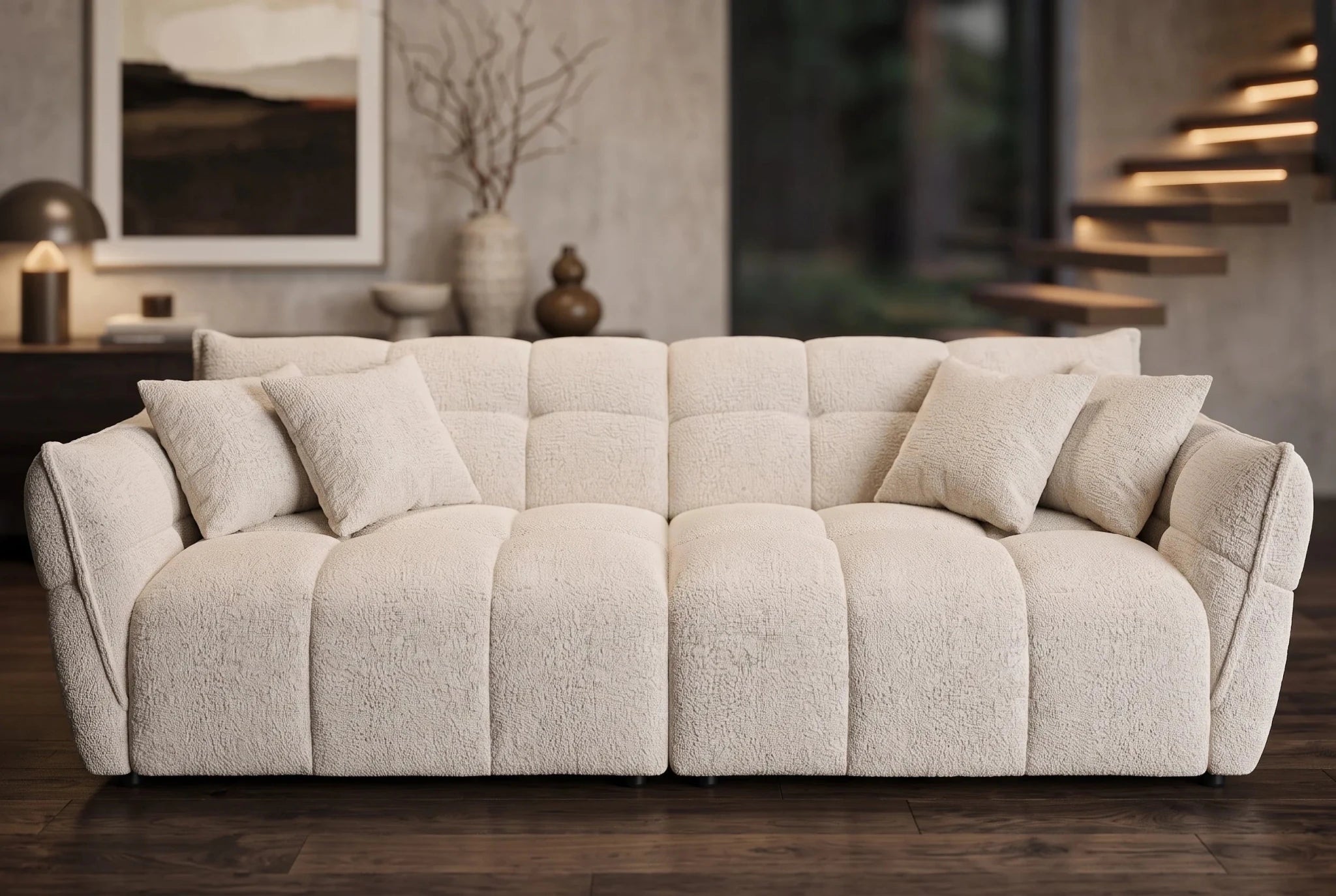 Beżowa sofa CLOUD w tkaninie boucle o miękkiej zaokrąglonej formie do nowoczesnego salonu