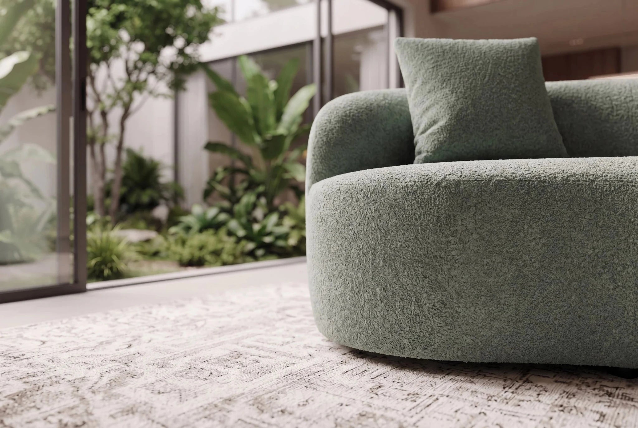 Zielona sofa ATELIER 230 cm 3-osobowa w tkaninie bouclé o zaokrąglonych kształtach