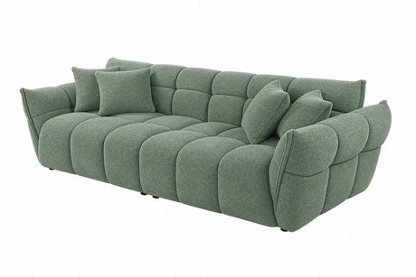 Zielona sofa CLOUD w tkaninie bouclé o miękkiej zaokrąglonej formie do nowoczesnego salonu
