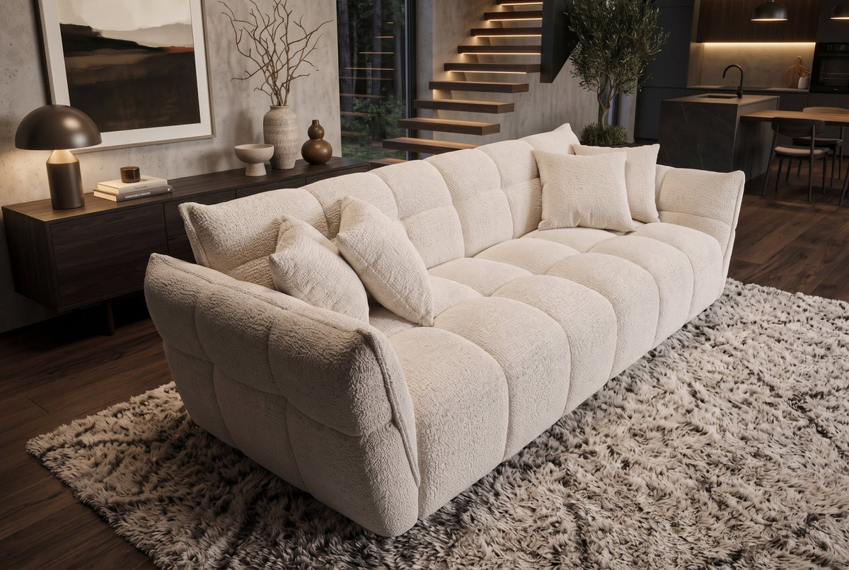Beżowa sofa CLOUD w tkaninie boucle o miękkiej zaokrąglonej formie do nowoczesnego salonu