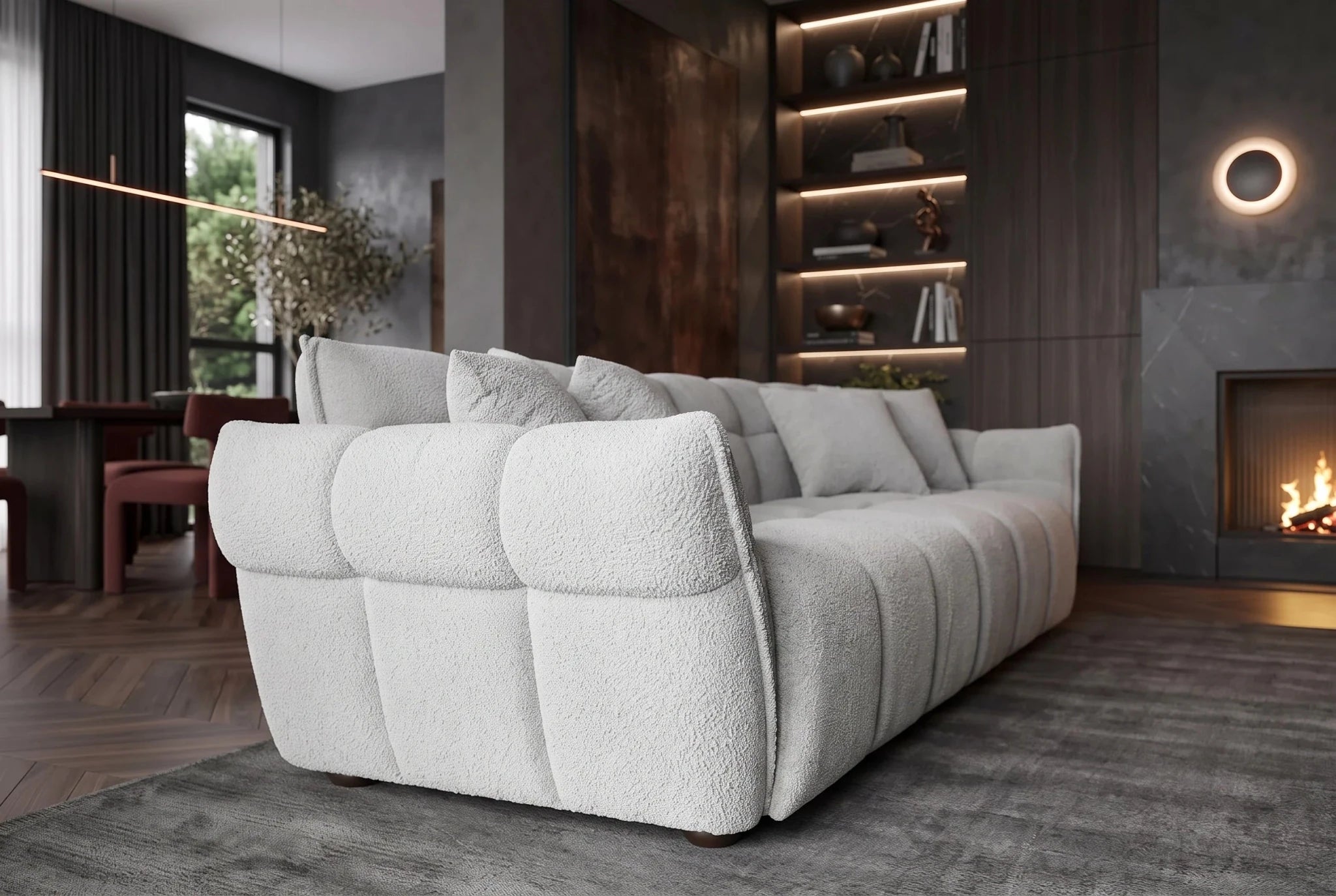 Szara sofa CLOUD w tkaninie bouclé o miękkiej zaokrąglonej formie do nowoczesnego salonu
