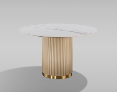 Nowoczesny stół w kolorze złota z białym owalnym blatem syntetycznym, na  ryflowanej podstawie ze złotym wykończeniem.