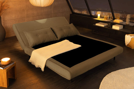 Sofa rozkładana zielona 140 cm do nowoczesnego salonu.