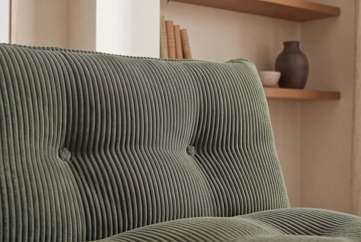 Zielona sofa rozkładana 190 cm z tapicerką sztruksową i czarnymi nogami drewnianymi