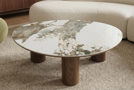 Stolik kawowy 110 × 80 cm z biało-brązowym ceramicznym blatem i trzema nogami w kolorze orzechowego brązu.